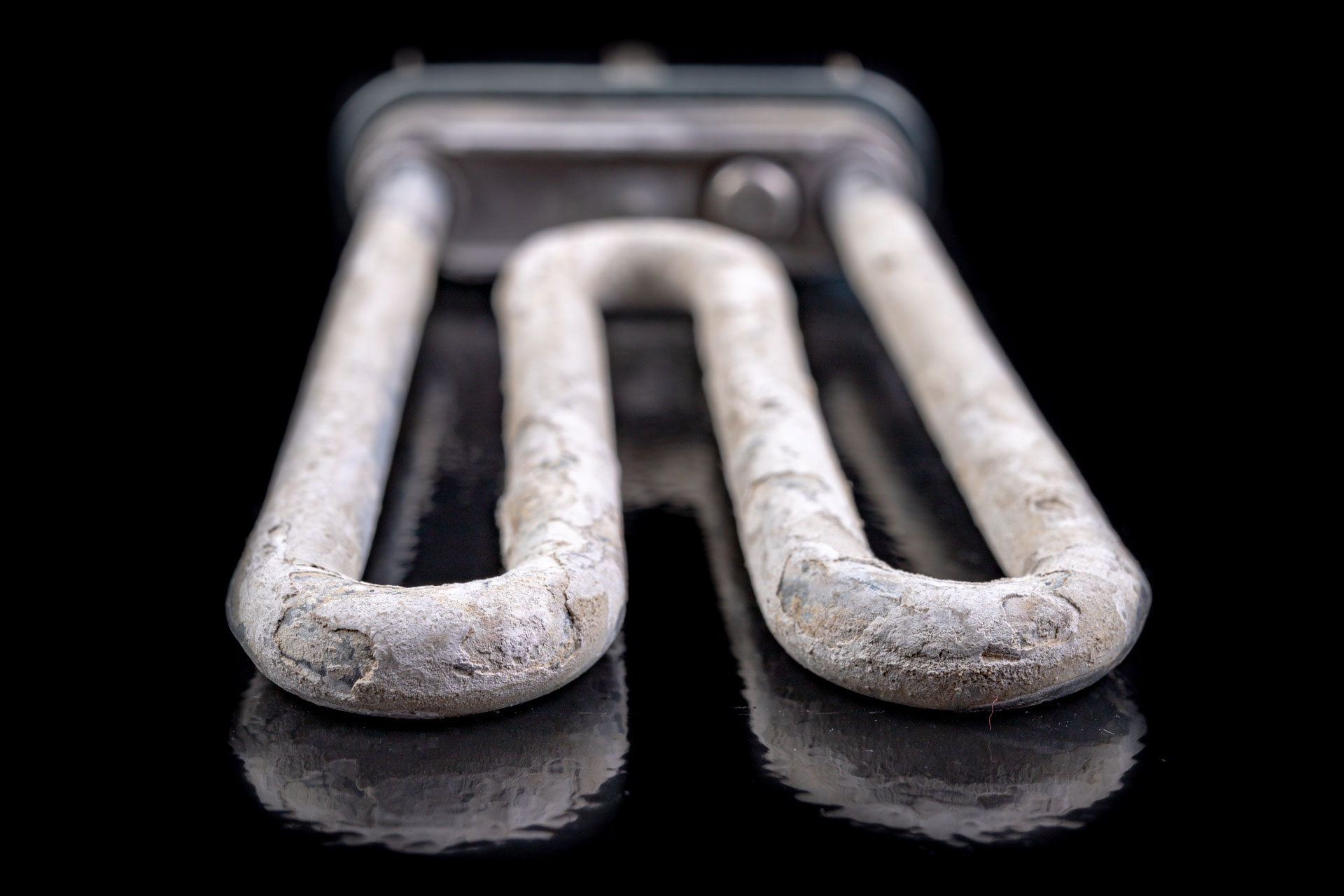 Verkalkter Heizstab © Adobe Stock